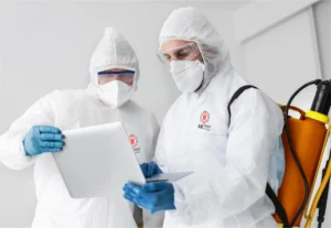 Pest control technician conducting a thorough home inspection