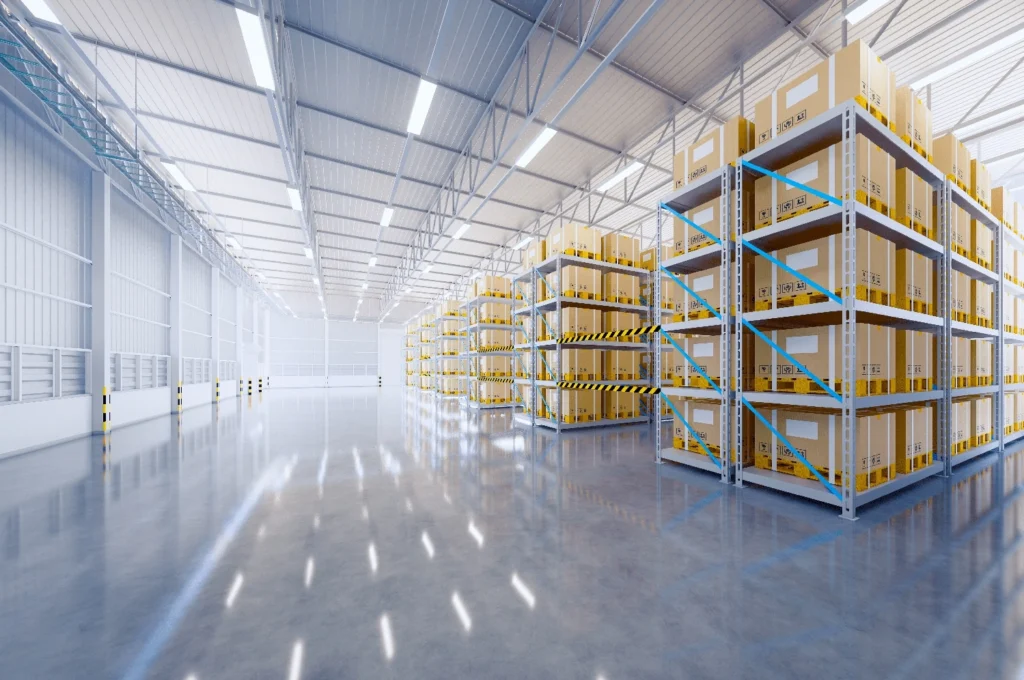 Pest control technician treating a warehouse facility in Bradford